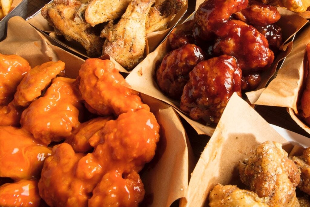 Multiple flavors of 30-piece boneless wings from Charleys Cheesesteaks. Wings near me.