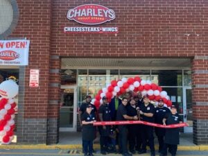 Employees at Charleys Philly Steaks during the grand opening celebration for the Lakewood City Center location in Lakewood, Ohio.
