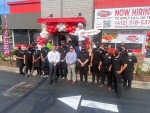 The store exterior and employees at Charleys Philly Steaks and Wings on San Jose Blvd. in Jacksonville, Florida.