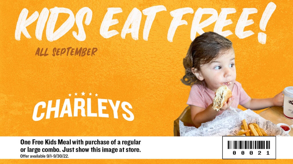 An image of a child eating a Charleys Kids Meal. White text against a yellow background reads "Kids Eat Free". Text below reads "One free Kids Meal with purchase of a regular or large combo. Just show this image at store. Offer available 9/1-9/30/22." A barcode reads 00021.