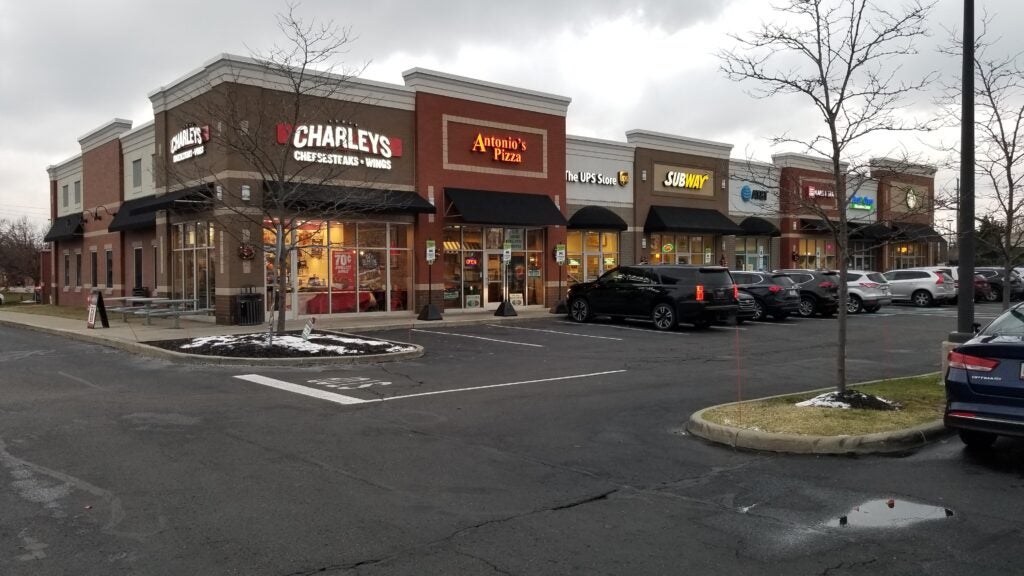 The exterior entrance of Charleys Cheesesteaks and Wings in Solon Village during our grand opening in November 2022.