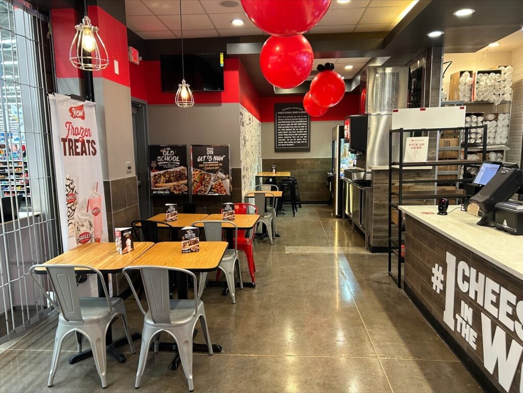 The front counter and dining area at Charleys Cheesesteaks and Wings in Frisco, TX during the grand opening in December 2022.
