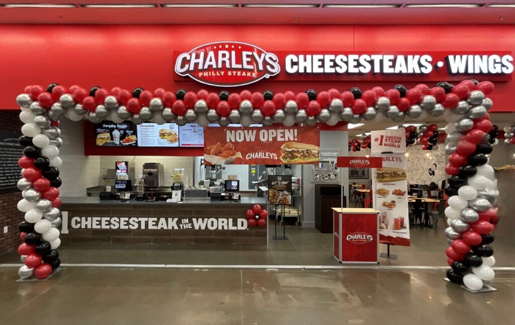 The front counter and dining area at Charleys Cheesesteaks and Wings at W. University Blvd. during the grand opening in 2023.