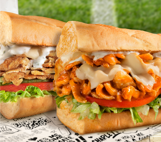close up of Charleys chicken philly cheesesteak and buffalo chicken philly, cheesesteak near me